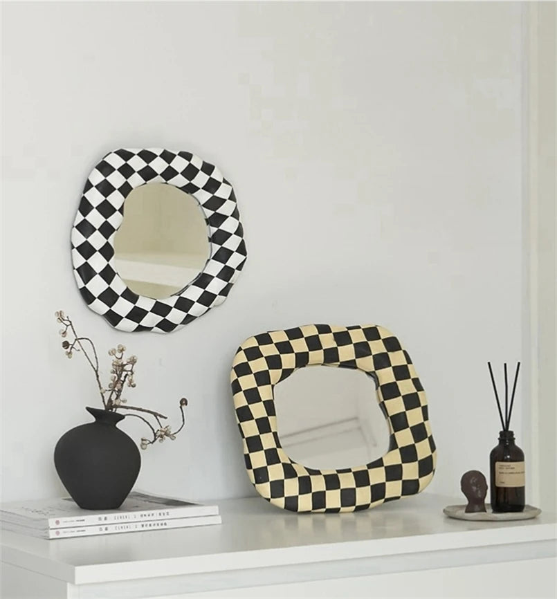 black white and beige checker print mirrors with organic shapes